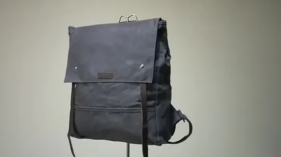 中国の卸売：ポケット付きシンプルなコットンキャンバスバックパック、学生レクリエーションスポーツ用のカスタムエンボスロゴバックパック、旅行用バックパック、デイパック